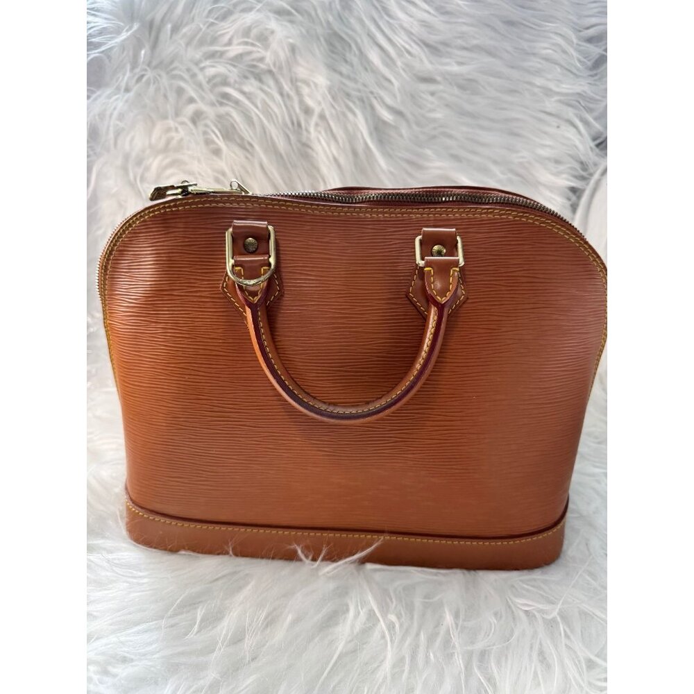 Louis Vuitton Alma PM Epi Leatherโ Handbag With Gold Hardware